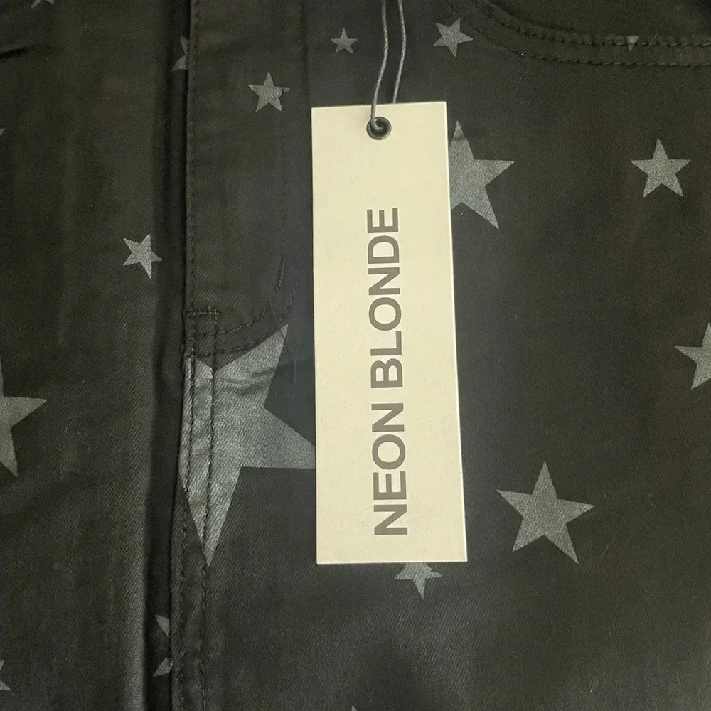 Neon blonde black star tease mini skirt NWT size 27.